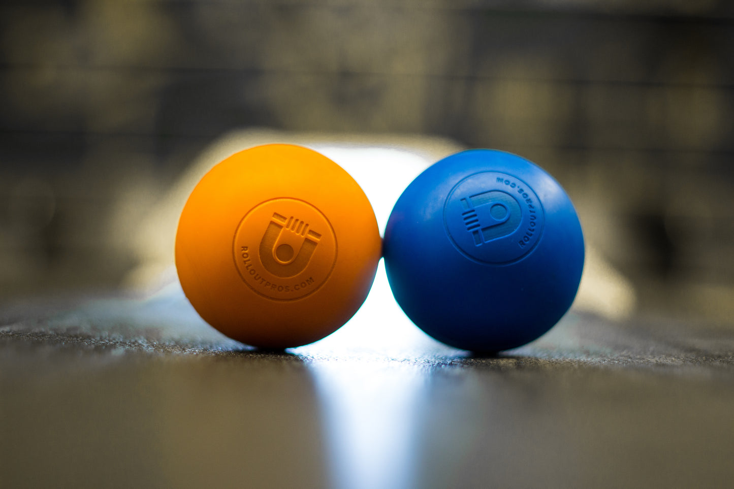 orange and blue massage balls